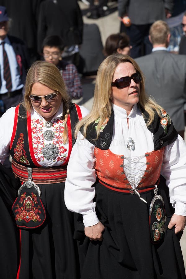 Oslo, Norway - May 17, 2016: Women wearing traditional Norwegian costume - bunad - on Norway`s National Day, May 17th. Oslo, Norway - May 17, 2016: Women wearing traditional Norwegian costume - bunad - on Norway`s National Day, May 17th