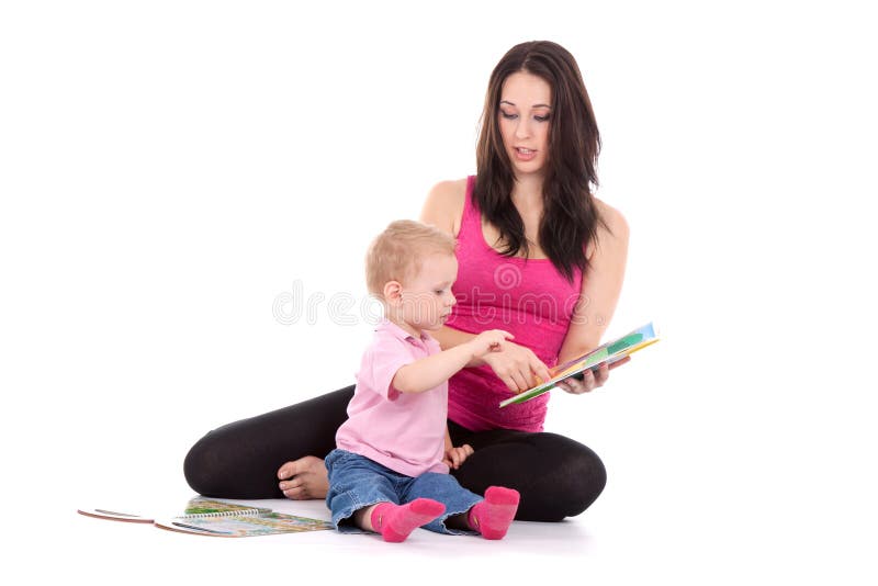 Beautiful happy mother with child 2 years boy read book. Beautiful happy mother with child 2 years boy read book