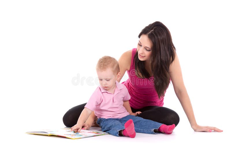 Beautiful happy mother with child 2 years boy read book. Beautiful happy mother with child 2 years boy read book