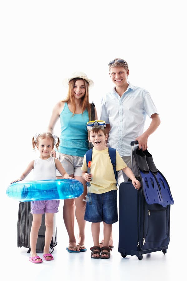 A happy family with their suitcases on a white background. A happy family with their suitcases on a white background