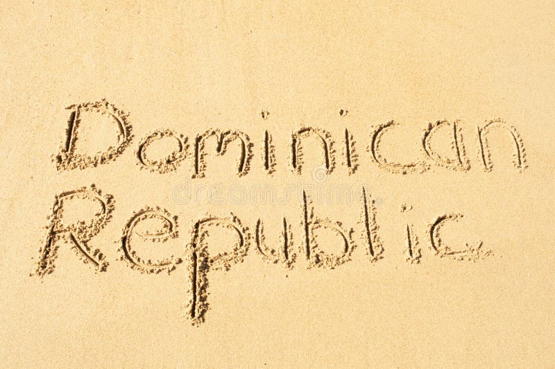 A picture of the words Dominican Republic drawn in the sand. A picture of the words Dominican Republic drawn in the sand