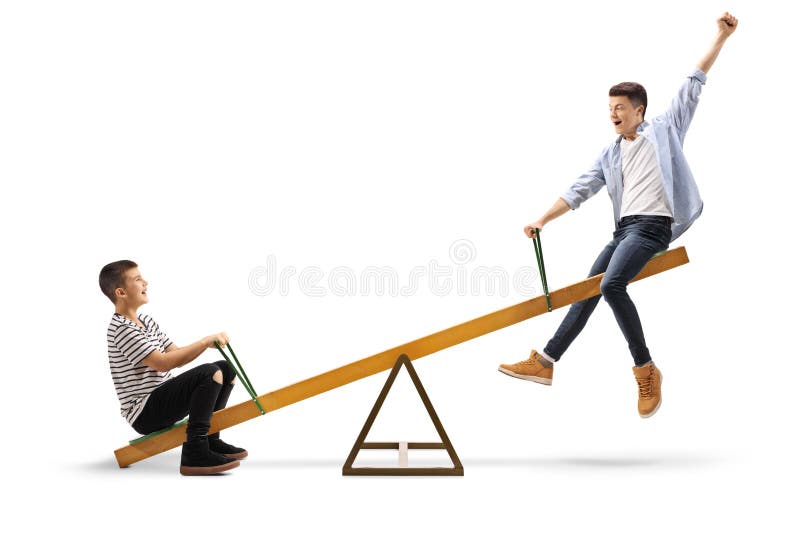 Δύο εύθυμοι έφηβοι seesaw στοκ εικόνες