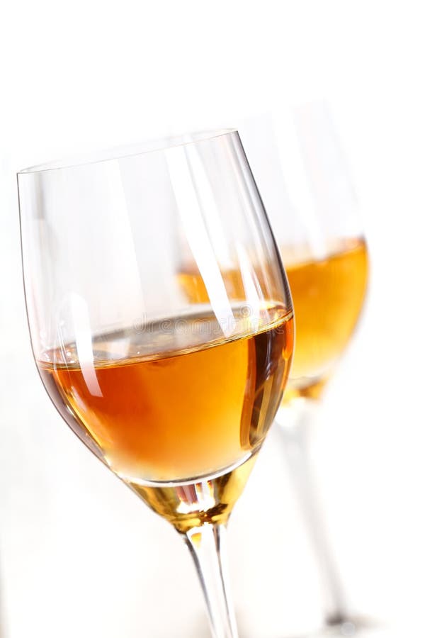 Two glasses of sherry isolated on white background. Two glasses of sherry isolated on white background