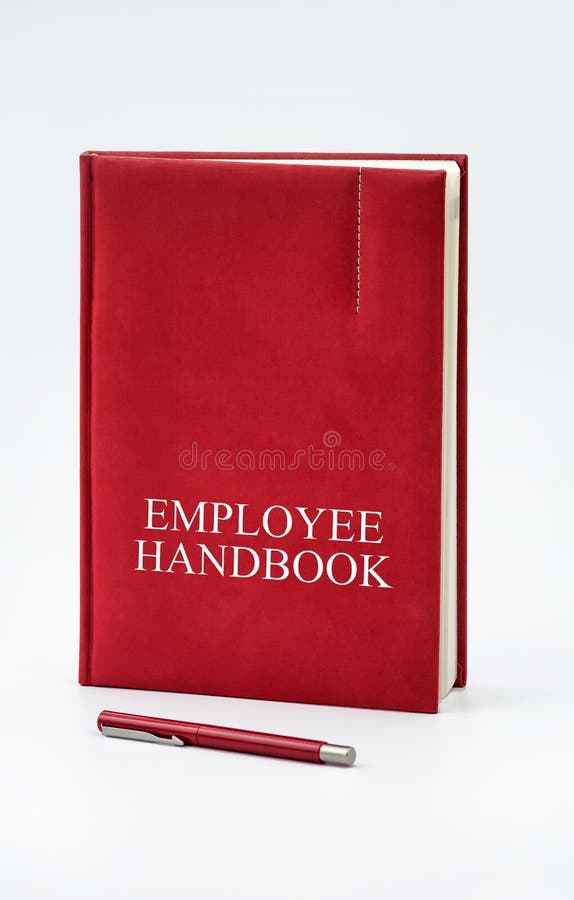 Employee Handbook or manual with a pen and paper on a white table in an office - personnel management policy, explains business goals, results, defines personnel practices. Employee Handbook or manual with a pen and paper on a white table in an office - personnel management policy, explains business goals, results, defines personnel practices