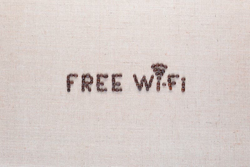 Ελεύθερο σημάδι wifi που γίνεται από τα φασόλια καφέ στο υπόβαθρο linea, τοπ άποψη, ευθυγραμμισμένο κέντρο στοκ εικόνες με δικαίωμα ελεύθερης χρήσης Ελεύθερο σημάδι wifi που γίνεται από τα φασόλια καφέ στο υπόβαθρο linea, τοπ άποψη, ευθυγραμμισμένο κέντρο στοκ εικόνες με δικαίωμα ελεύθερης χρήσης