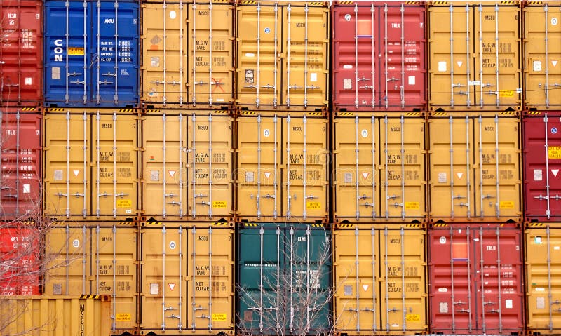 A background pattern of colorful shipping containers stacked properly. A background pattern of colorful shipping containers stacked properly