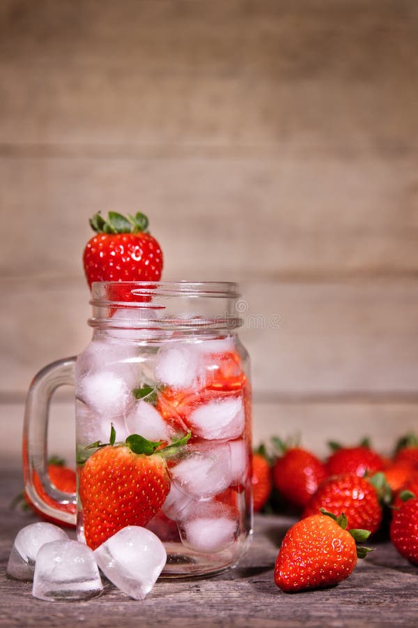 Infused or Detox Water with strawberries, fresh organic selfmade lemonade. Infused or Detox Water with strawberries, fresh organic selfmade lemonade
