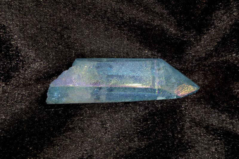 Gold vapor infused quartz crystal. Gold vapor infused quartz crystal.