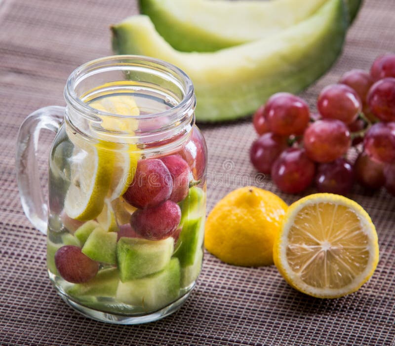 Summer fresh fruit Flavored infused water of grape, lemon and melon. Summer fresh fruit Flavored infused water of grape, lemon and melon