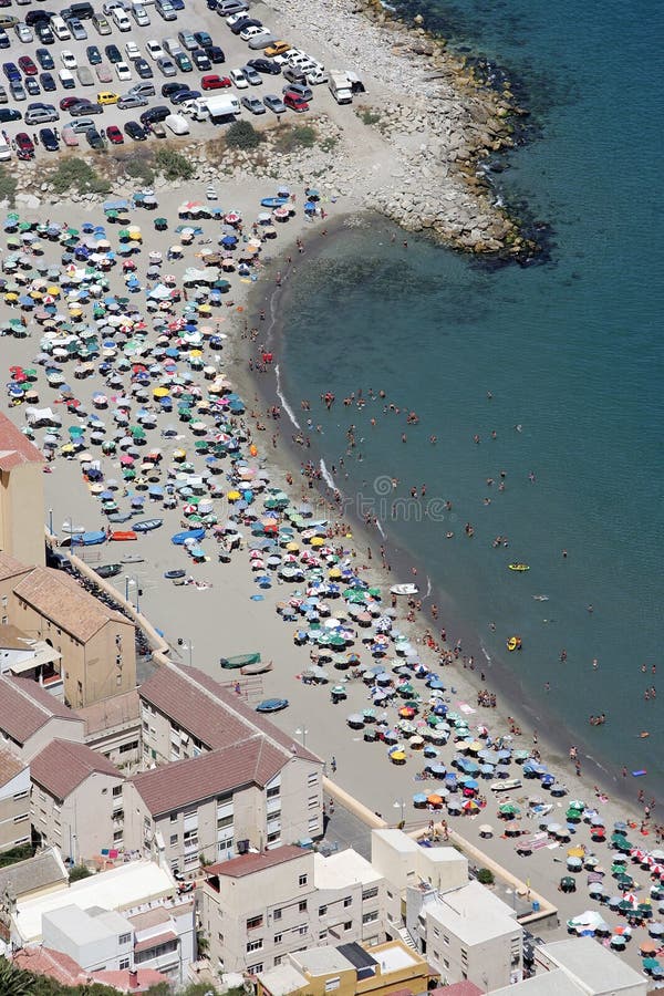 Aerial view of people sunbathing on the beach in Gibraltar as seen from the top of the rock. Aerial view of people sunbathing on the beach in Gibraltar as seen from the top of the rock