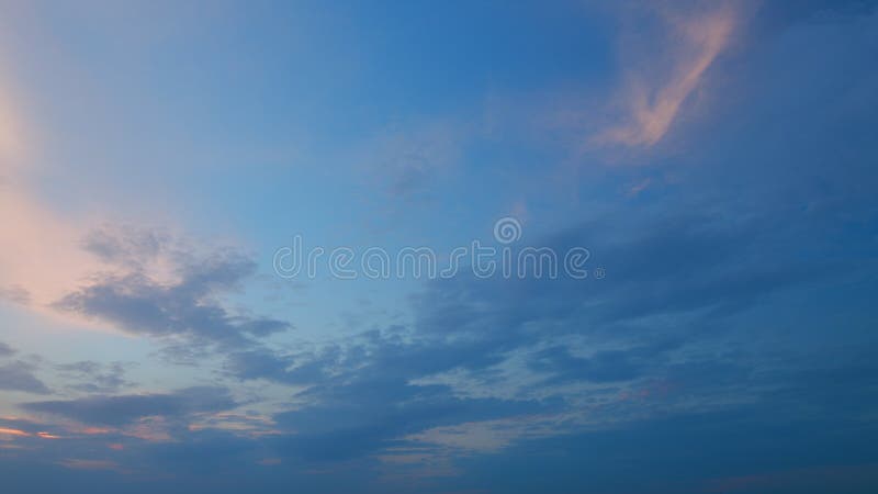 Timelapse. Dramatic white and gray cloud. Light puppy fluffy cirrocumulus cloudscape in tropical summer or spring sunlight. Timelapse. Dramatic white and gray cloud. Light puppy fluffy cirrocumulus cloudscape in tropical summer or spring sunlight.