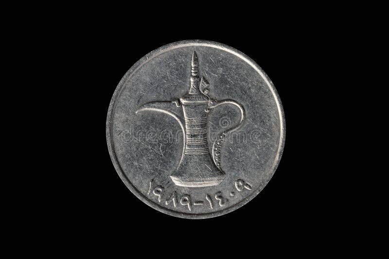 United Arab Emirates 1 Dirham coin showing a traditional Arabic Dallah coffee pot cut out and isolated on a black background, stock photo image. United Arab Emirates 1 Dirham coin showing a traditional Arabic Dallah coffee pot cut out and isolated on a black background, stock photo image