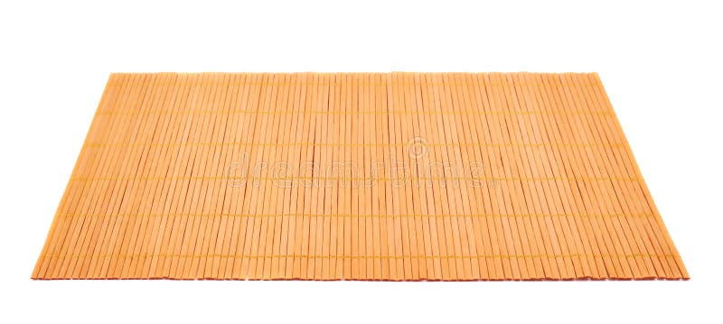 Bamboo brown straw serving mat isolated over white background. Bamboo brown straw serving mat isolated over white background