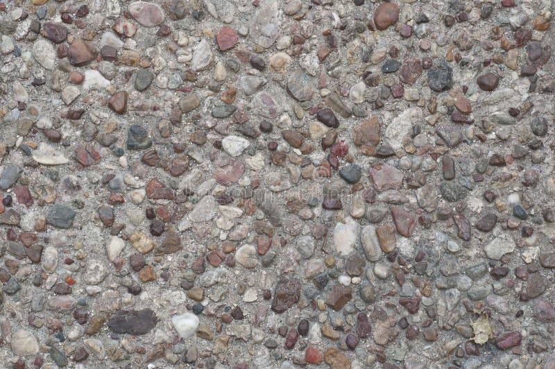 Concrete ground texture with stones. Concrete ground texture with stones