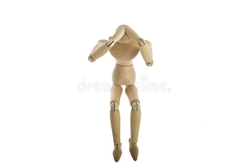 Wooden Mannequin with head ache isolated on white. Wooden Mannequin with head ache isolated on white