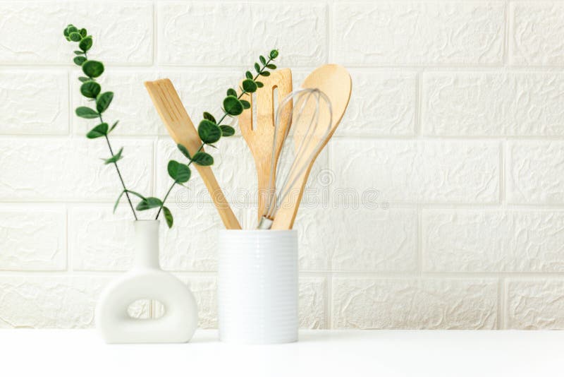 Select focus. Kitchen tools and kitchenware utensil object with ingredients on kitchen shelf wood white for healthy eat and health care life.  Wall white brick background, copy space for text. Select focus. Kitchen tools and kitchenware utensil object with ingredients on kitchen shelf wood white for healthy eat and health care life.  Wall white brick background, copy space for text