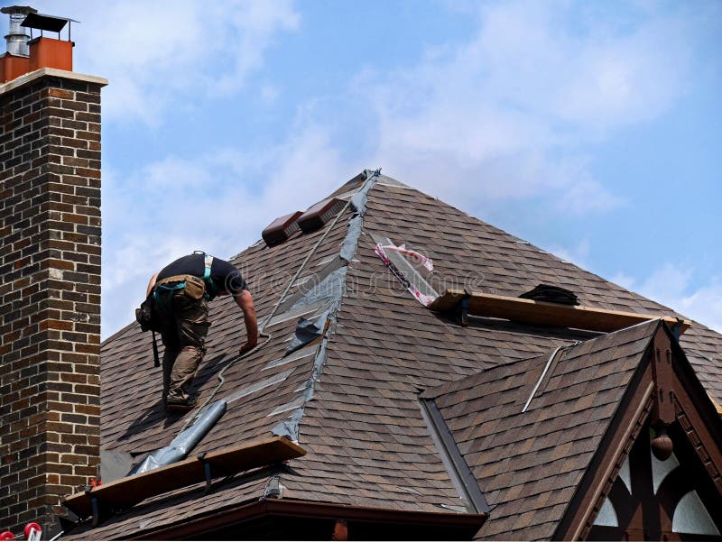 Repair on a steeply sloping shingle roof. Repair on a steeply sloping shingle roof