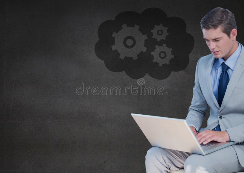 Επιχειρησιακό άτομο με το lap-top ενάντια στον γκρίζο τοίχο και σύννεφο με το εργαλείο γραφικό στοκ φωτογραφία Επιχειρησιακό άτομο με το lap-top ενάντια στον γκρίζο τοίχο και σύννεφο με το εργαλείο γραφικό στοκ φωτογραφία