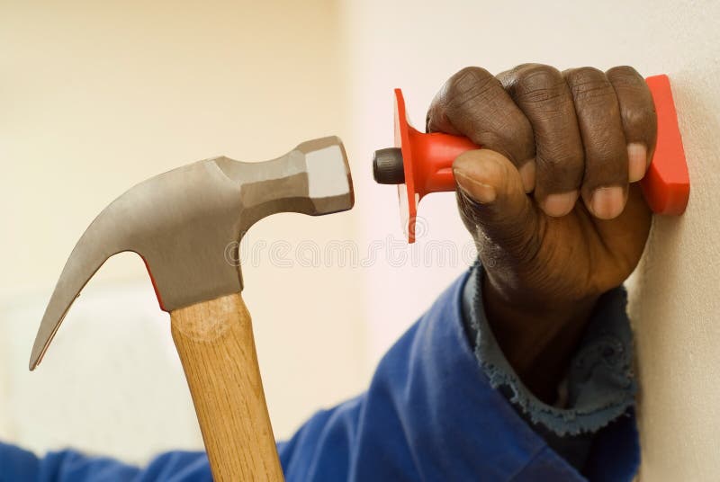 African American Construction Worker, Handyman, Holding Hammer, In Motion. African American Construction Worker, Handyman, Holding Hammer, In Motion
