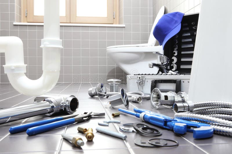Plumber tools and equipment in a bathroom, plumbing repair service, assemble and install concept. Plumber tools and equipment in a bathroom, plumbing repair service, assemble and install concept