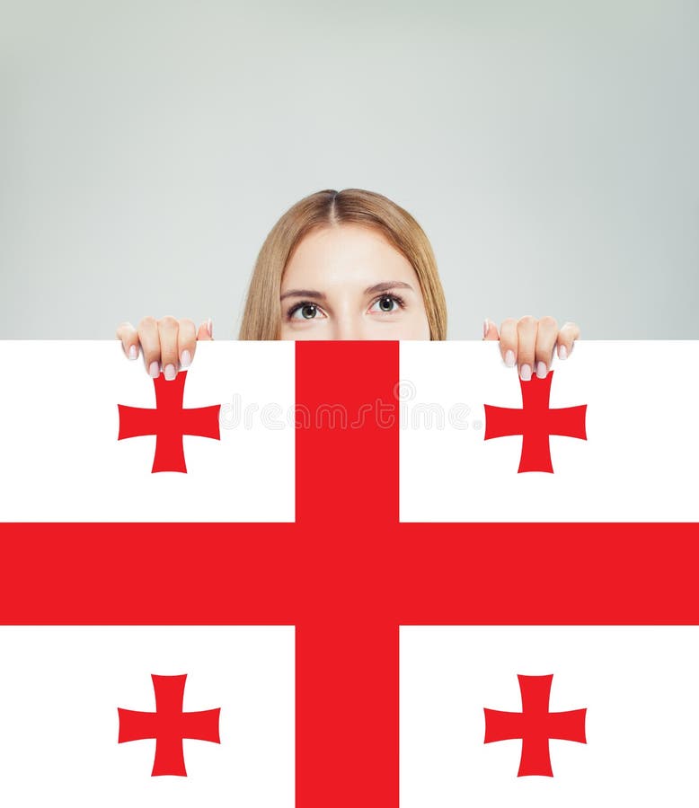 Ευτυχής σπουδαστής κοριτσιών με το υπόβαθρο σημαιών της Γεωργίας στοκ εικόνα με δικαίωμα ελεύθερης χρήσης Ευτυχής σπουδαστής κοριτσιών με το υπόβαθρο σημαιών της Γεωργίας στοκ εικόνα με δικαίωμα ελεύθερης χρήσης