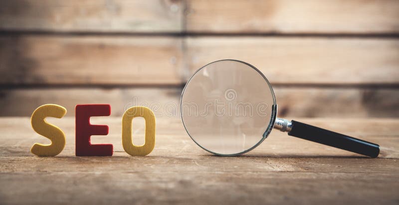 Ζωηρόχρωμη λέξη Seo με την ενίσχυση - γυαλί Βελτιστοποίηση μηχανών αναζήτησης στοκ φωτογραφίες Ζωηρόχρωμη λέξη Seo με την ενίσχυση - γυαλί Βελτιστοποίηση μηχανών αναζήτησης στοκ φωτογραφίες