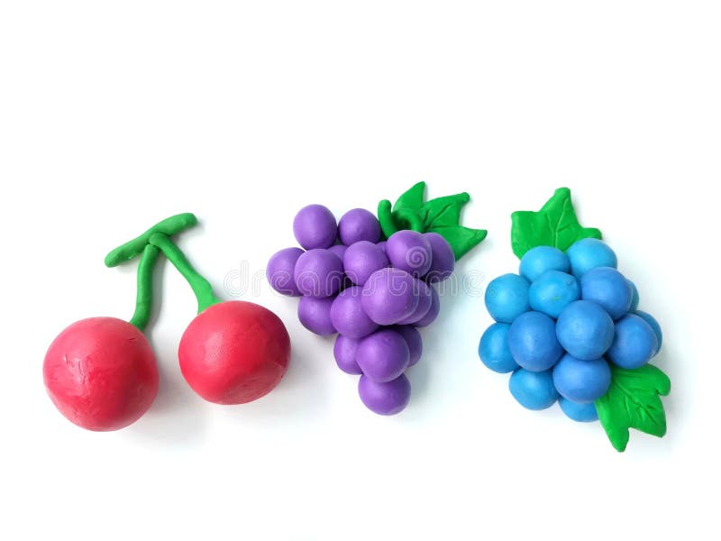 Ζωηρόχρωμος άργιλος plasticine, χειροποίητα φρούτα ποικιλίας, εύγευστη ζύμη βακκινίων σταφυλιών κερασιών στοκ φωτογραφίες με δικαίωμα ελεύθερης χρήσης