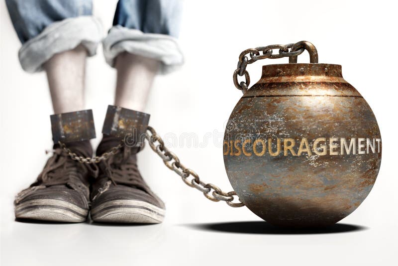 Discouragement can be a big weight and a burden with negative influence - Discouragement role and impact symbolized by a heavy prisoner`s weight attached to a person, 3d illustration. Discouragement can be a big weight and a burden with negative influence - Discouragement role and impact symbolized by a heavy prisoner`s weight attached to a person, 3d illustration