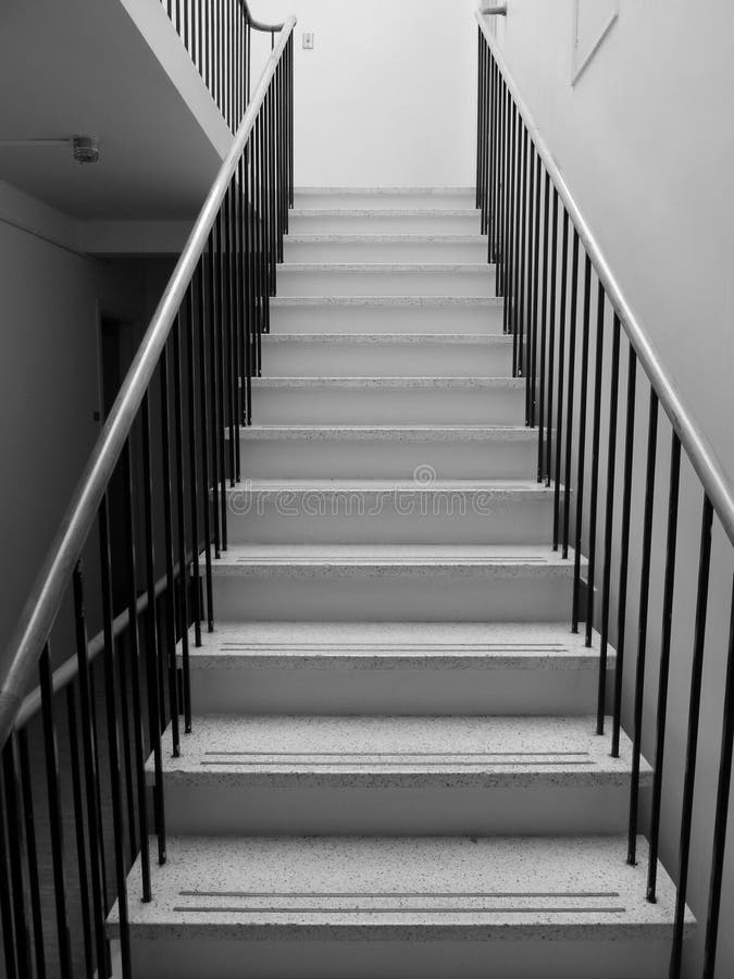 Black nd white terrazzo composite marble staircase in 1950s apartment. Black nd white terrazzo composite marble staircase in 1950s apartment