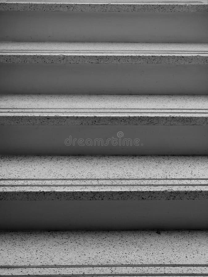 Black nd white terrazzo composite marble staircase in 1950s apartment. Black nd white terrazzo composite marble staircase in 1950s apartment