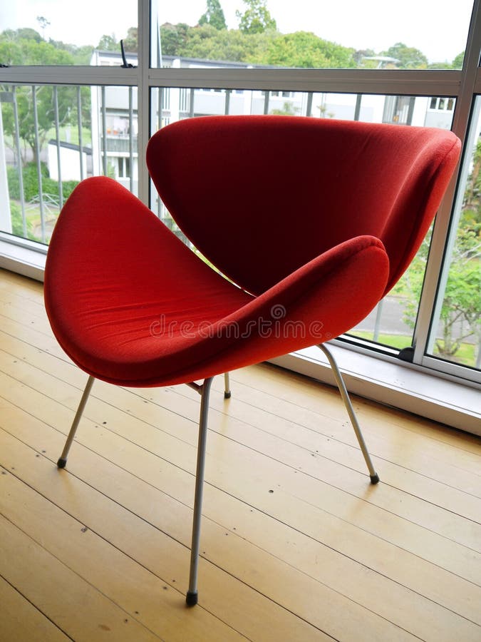 Retro modernist red chair in 1950s apartment. Retro modernist red chair in 1950s apartment