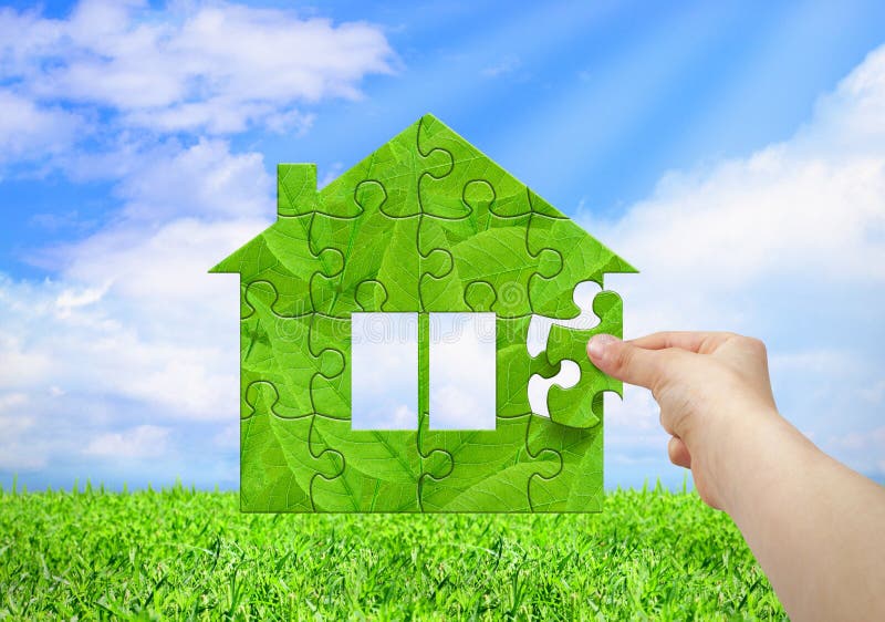 Η εγχώρια έννοια Eco, χέρι χτίζει το θερμοκήπιο από το γρίφο στοκ εικόνα με δικαίωμα ελεύθερης χρήσης Η εγχώρια έννοια Eco, χέρι χτίζει το θερμοκήπιο από το γρίφο στοκ εικόνα με δικαίωμα ελεύθερης χρήσης