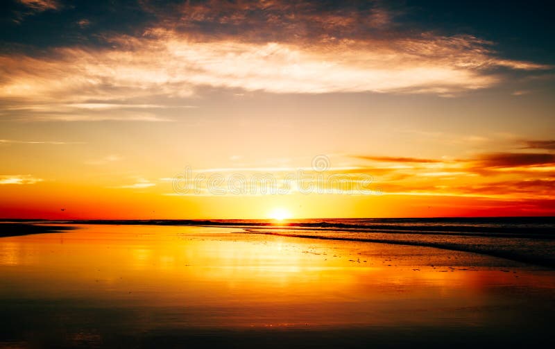 Sunset reflection at the beach. Sunset reflection at the beach.