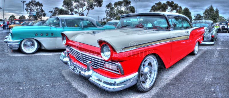 Classic red and white 1950s Ford Fairlane 2 door sedan on display at car and bike show in Melbourne, Australia. Classic red and white 1950s Ford Fairlane 2 door sedan on display at car and bike show in Melbourne, Australia