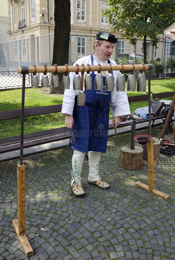 The craftsman is introducing the bells for sheep during Festival Craftsmen Days ULUV in summer 2013 in Bratislava, Slovakia. Festival as a part of The Summer of Culture festival Bratislava, Slovakia, was held from August 31 to September 1, 2013, in the pedestrian zone of the Capital. There are over 100 craftsmen expected to attend and perform their skills in crafts. The craftsman is introducing the bells for sheep during Festival Craftsmen Days ULUV in summer 2013 in Bratislava, Slovakia. Festival as a part of The Summer of Culture festival Bratislava, Slovakia, was held from August 31 to September 1, 2013, in the pedestrian zone of the Capital. There are over 100 craftsmen expected to attend and perform their skills in crafts.