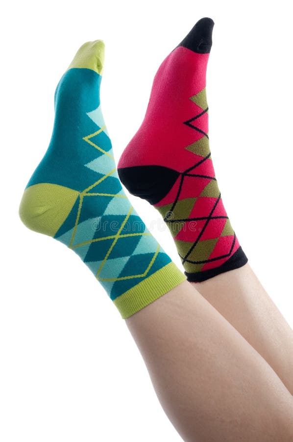 Vertical image brightly colored socks on a white background. Vertical image brightly colored socks on a white background