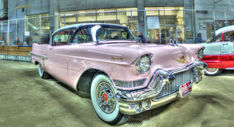 Custom pink 1950s American Cadillac on display at car show in Melbourne, Australia. Custom pink 1950s American Cadillac on display at car show in Melbourne, Australia