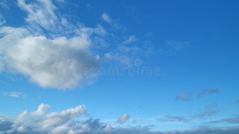 Timelapse. Sunbeam shining through sunset sky in summer sunshine evening. Beautiful sky with cirrocumulus clouds background. Timelapse. Sunbeam shining through sunset sky in summer sunshine evening. Beautiful sky with cirrocumulus clouds background.