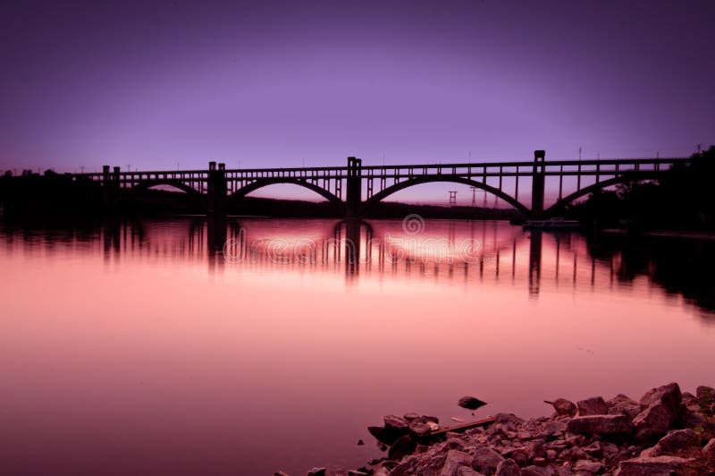 Long exposure photo of the bridge during sunset. Long exposure photo of the bridge during sunset