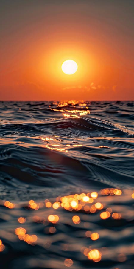 A sunset over the ocean with waves and sun. AI generated. A sunset over the ocean with waves and sun. AI generated