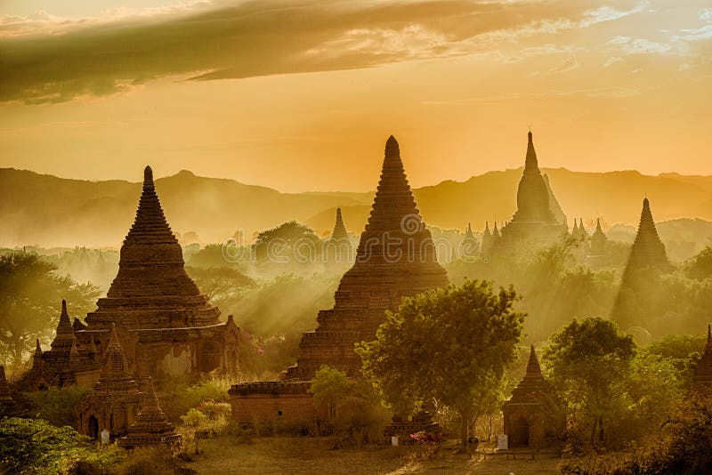 Sun is setting over old pagodas of an ancient city of Bagan, Myanmar. Sun is setting over old pagodas of an ancient city of Bagan, Myanmar