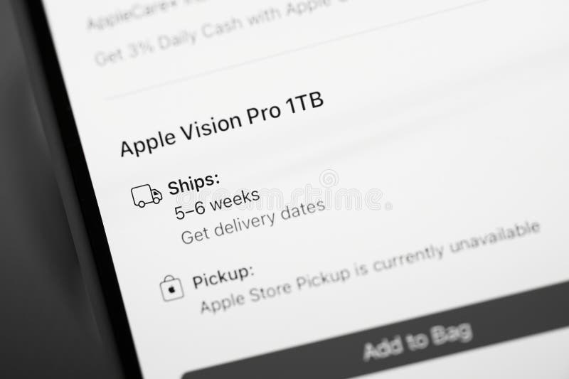 California, USA - Jan 21, 2024: A black and white image of the Apple iPhone 15 Pro displaying the delivery date for the Apple Vision Pro mixed reality headset developed by Apple Inc. California, USA - Jan 21, 2024: A black and white image of the Apple iPhone 15 Pro displaying the delivery date for the Apple Vision Pro mixed reality headset developed by Apple Inc
