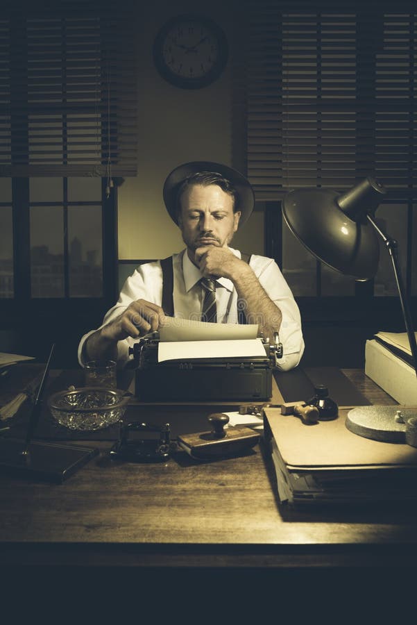 Confident journalist checking errors on text working at his desk, 1950s style office. Confident journalist checking errors on text working at his desk, 1950s style office.