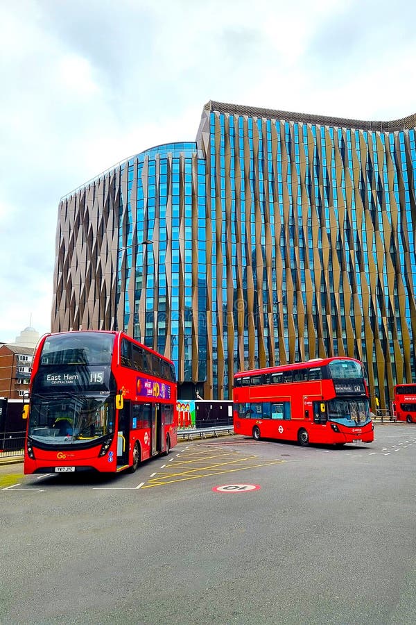 London, United Kingdom, February 6, 2022: bus stop for the famous double-decker red buses in London. London, United Kingdom, February 6, 2022: bus stop for the famous double-decker red buses in London