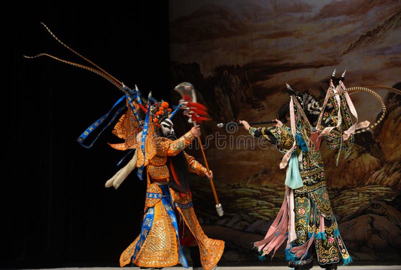 This opera tells a patriotic story how does an old woman of a hundred years old go out for a battle with the twelve women generals of Yang family herself. During the period of Renzong in Song Dynasty, the king of Western Xia invaded its border region, the Song Dynasty’s supreme commander Yang Zongbao fought against the enemies bravely with his army, but unfortunately, he died in the battle by an arrow shot from hiding. Meanwhile, She Taijun of one hundred years old in Yang family was giving a banquet to celebrate her grandson Zongbao’s fiftieth birthday. Everyone in the family was grieved deeply when the tragic news came. When She Taijun heard that the royal court was going to cede territories for peace, she suppressed her grief, refuted the fallacy sternly, and decided to go for the battle herself with the women generals of the Yang family. The great-grandson Yang Wenguang wanted to go with them, his grandmother Princess Chai didn’t let him go in consideration of perpetuating the Yang line. She Taijun told him that he could challenge martial art skills with his mother Mu Guiying to prove whether he can go or not. With his mother’s pretending to fail by his spear skill and the help of Du Jine, the wife of Yang Yansi, Yang Wenguang got his wish. After being defeated utterly, the king of Western Xia intended to capture Yang The Beijing Opera Women Generals of Yang Family was performed in Jiangxi Art Center by The Beijing Opera Troupe of Fujian Province. This opera tells a patriotic story how does an old woman of a hundred years old go out for a battle with the twelve women generals of Yang family herself. During the period of Renzong in Song Dynasty, the king of Western Xia invaded its border region, the Song Dynasty’s supreme commander Yang Zongbao fought against the enemies bravely with his army, but unfortunately, he died in the battle by an arrow shot from hiding. Meanwhile, She Taijun of one hundred years old in Yang family was giving a banquet to celebrate her grandson Zongbao’s fiftieth birthday. Everyone in the family was grieved deeply when the tragic news came. When She Taijun heard that the royal court was going to cede territories for peace, she suppressed her grief, refuted the fallacy sternly, and decided to go for the battle herself with the women generals of the Yang family. The great-grandson Yang Wenguang wanted to go with them, his grandmother Princess Chai didn’t let him go in consideration of perpetuating the Yang line. She Taijun told him that he could challenge martial art skills with his mother Mu Guiying to prove whether he can go or not. With his mother’s pretending to fail by his spear skill and the help of Du Jine, the wife of Yang Yansi, Yang Wenguang got his wish. After being defeated utterly, the king of Western Xia intended to capture Yang The Beijing Opera Women Generals of Yang Family was performed in Jiangxi Art Center by The Beijing Opera Troupe of Fujian Province.