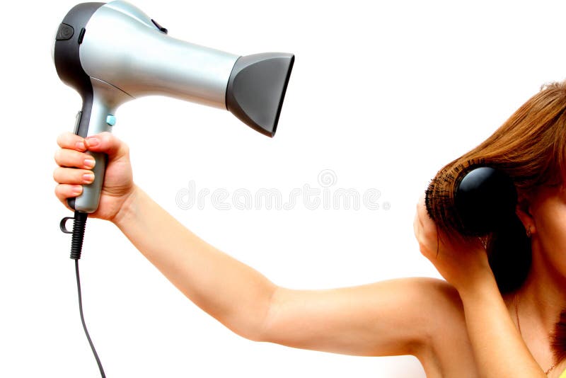 θηλυκή εκμετάλλευση χεριών hairdryer στοκ φωτογραφία με δικαίωμα ελεύθερης χρήσης