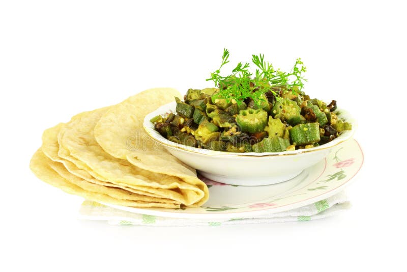 Fresh Indian masala fried okra bhindi or ladyfinger curry with tortilla. Fresh Indian masala fried okra bhindi or ladyfinger curry with tortilla