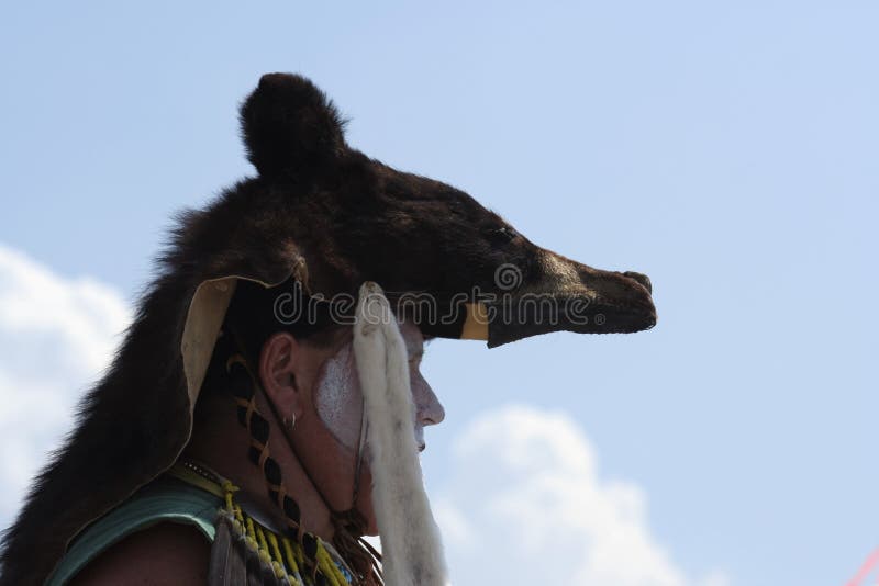 Native American Indian man dressed in traditional costume. Native American Indian man dressed in traditional costume.