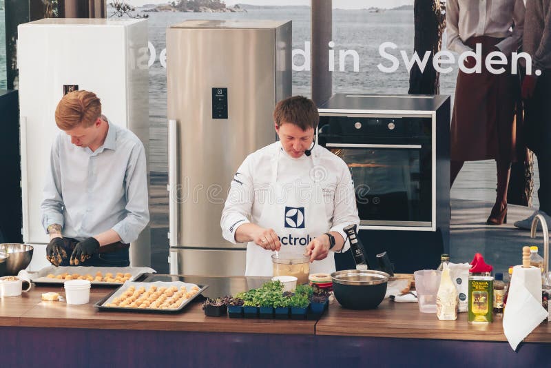 June 1, 2019 Festivities in the city on the day of Swedish culture Two cooks prepare food on a demonstration advertising campaign. June 1, 2019 Festivities in the city on the day of Swedish culture Two cooks prepare food on a demonstration advertising campaign