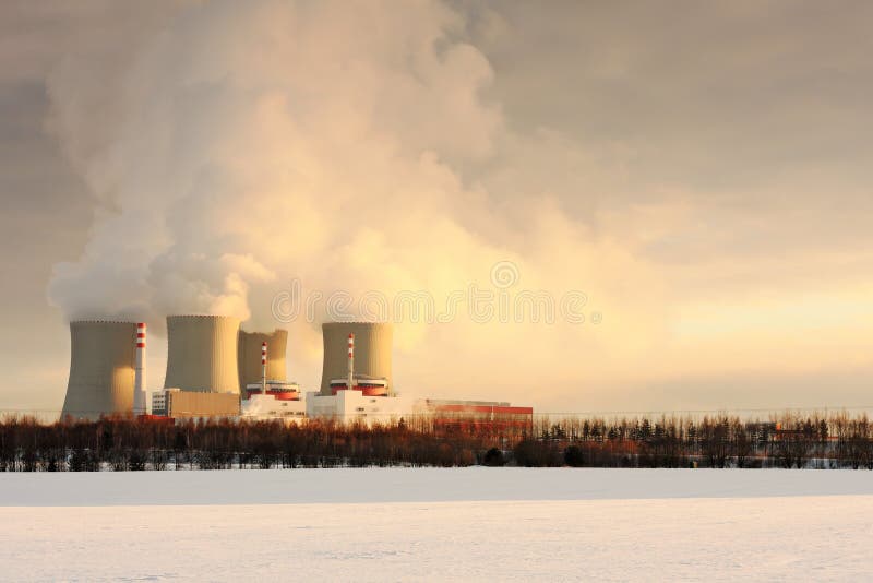 Image of smoking nuclear power plant in winter. Image of smoking nuclear power plant in winter.